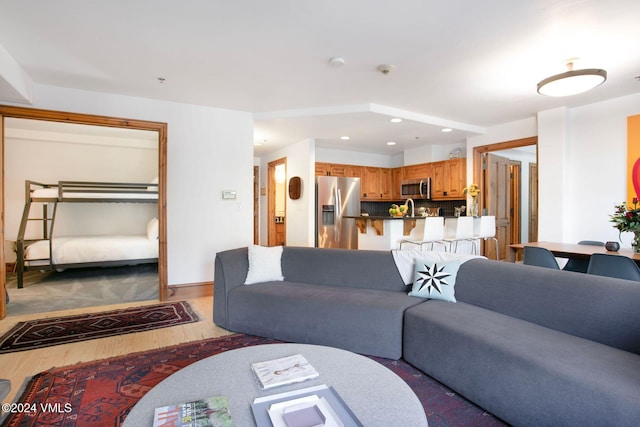 living room with hardwood / wood-style floors