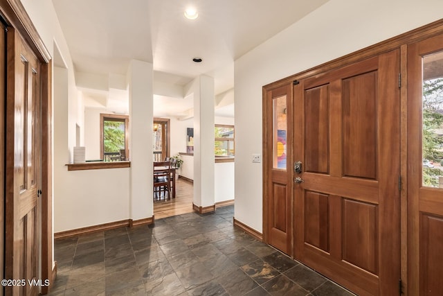 38 Millers Circle Rd, Edwards, CO 81632 - entrance foyer with plenty of natural light, dark stone finish floors, and recessed lighting