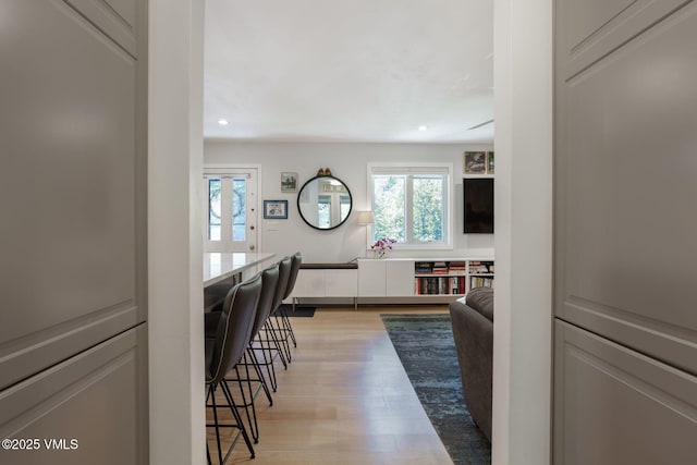 2783 Kinnikinnick Rd Unit 7, Vail, CO 81657 - hall featuring healthy amount of natural light, light wood finished floors, and recessed lighting