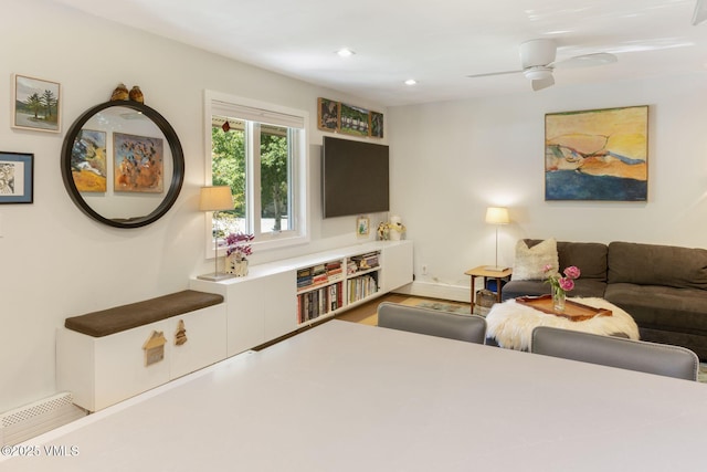 2783 Kinnikinnick Rd Unit 7, Vail, CO 81657 - living room featuring a ceiling fan, recessed lighting, and wood finished floors