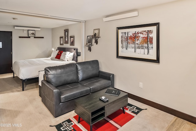 555 E Lionshead Cir Unit 207, Vail, CO 81657 - living room with baseboards and an AC wall unit