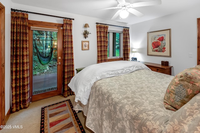 2832 Kinnickinnick Rd Unit 4, Vail, CO 81657 - carpeted bedroom with access to outside and a ceiling fan