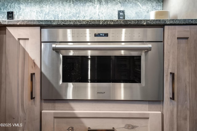 2832 Kinnickinnick Rd Unit 4, Vail, CO 81657 - detailed view of oven and dark countertops