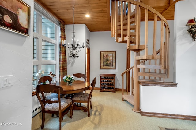 2832 Kinnickinnick Rd Unit 4, Vail, CO 81657 - dining room featuring wood ceiling, light carpet, a chandelier, stairs, and baseboard heating