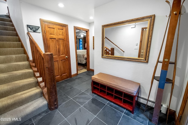 2832 Kinnickinnick Rd Unit 4, Vail, CO 81657 - foyer entrance featuring stairway, recessed lighting, and dark tile patterned flooring
