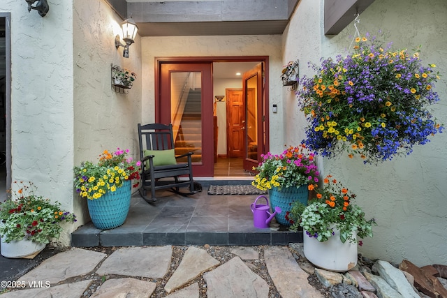 2832 Kinnickinnick Rd Unit 4, Vail, CO 81657 - doorway to property featuring stucco siding
