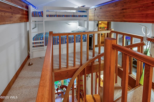 2832 Kinnickinnick Rd Unit 4, Vail, CO 81657 - stairs featuring carpet flooring and baseboards