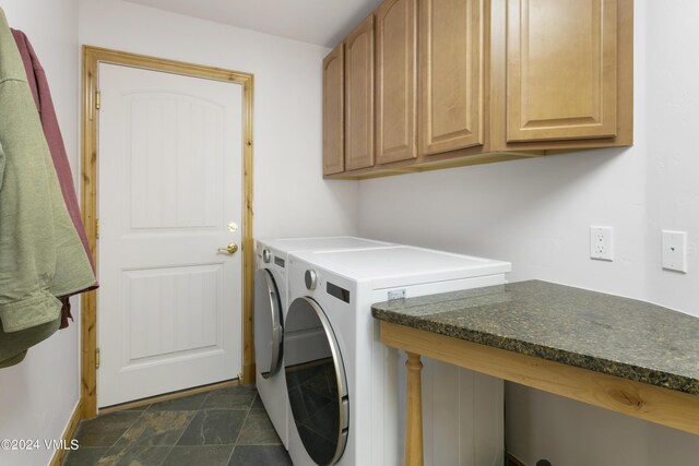 laundry area with cabinets and independent washer and dryer