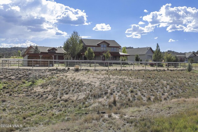 view of yard featuring a rural view