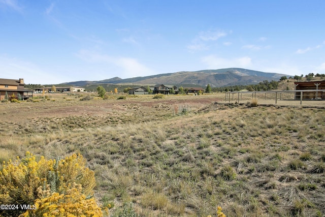 property view of mountains featuring a rural view