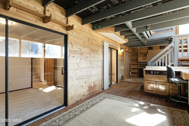 717 Bull Run Unit A, Eagle, CO 81631 - interior space with wooden walls, hardwood / wood-style floors, and stairs