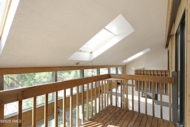 717 Bull Run Unit A, Eagle, CO 81631 - hallway with a skylight, a textured ceiling, and vaulted ceiling