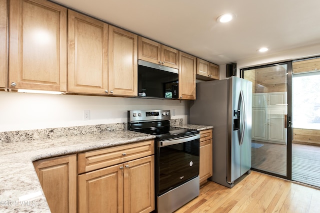 717 Bull Run Unit A, Eagle, CO 81631 - kitchen with stainless steel appliances, light wood-style floors, recessed lighting, and light brown cabinetry