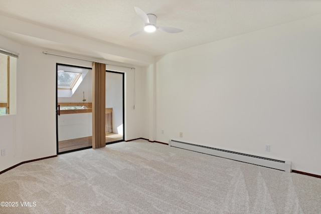 717 Bull Run Unit A, Eagle, CO 81631 - unfurnished room featuring baseboard heating, light carpet, and ceiling fan