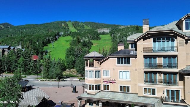 26 Avondale Ln Unit 114-H, Beaver Creek, CO 81620 - view of property featuring a mountain view