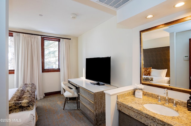 26 Avondale Ln Unit 114-H, Beaver Creek, CO 81620 - living area with dark carpet, a desk, and recessed lighting
