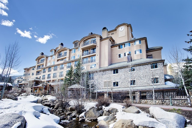 26 Avondale Ln Unit 114-H, Beaver Creek, CO 81620 - snow covered property featuring a view of apartment building / complex