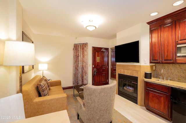 26 Avondale Ln Unit 114-H, Beaver Creek, CO 81620 - living room featuring a fireplace, recessed lighting, and baseboards