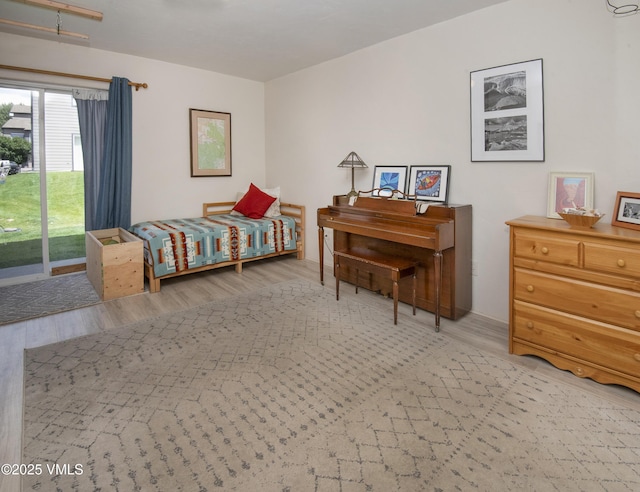 104-2 Quail Cir, Gypsum, CO 81637 - bedroom with wood finished floors and access to exterior