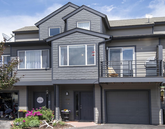 104-2 Quail Cir, Gypsum, CO 81637 - view of property with a balcony and a garage