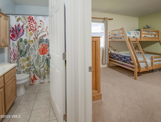 104-2 Quail Cir, Gypsum, CO 81637 - bathroom featuring vanity, curtained shower, and tile patterned flooring