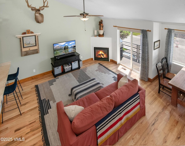 104-2 Quail Cir, Gypsum, CO 81637 - living room featuring healthy amount of natural light, wood finished floors, and a ceiling fan