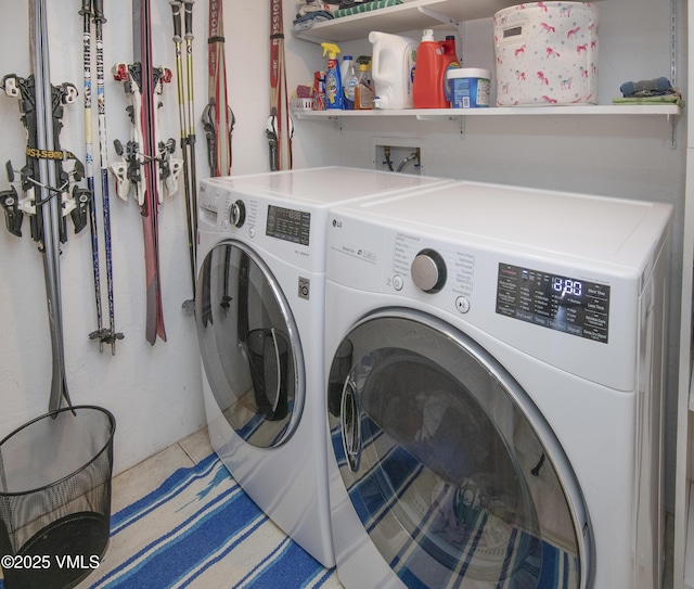 104-2 Quail Cir, Gypsum, CO 81637 - washroom featuring washing machine and clothes dryer and tile patterned flooring