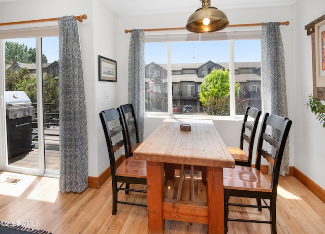 104-2 Quail Cir, Gypsum, CO 81637 - dining room with wood finished floors and plenty of natural light