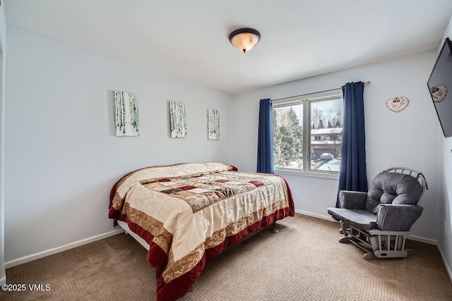 carpeted bedroom with baseboards