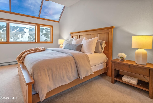 carpeted bedroom with a baseboard heating unit and vaulted ceiling