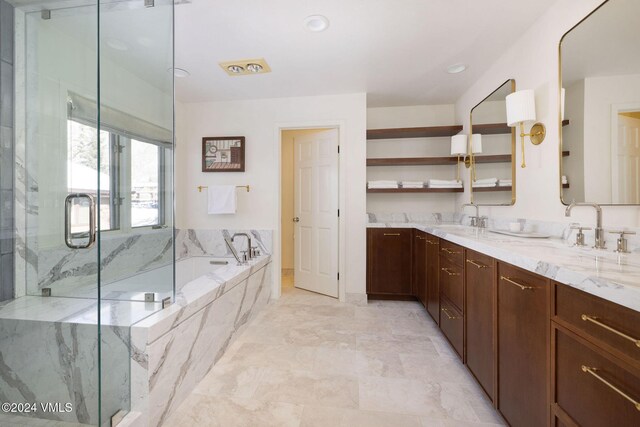 bathroom featuring plus walk in shower and vanity