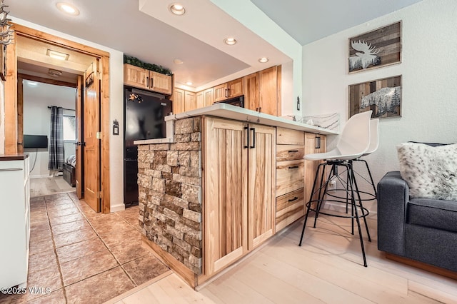 4570 Vail Racquet Club Dr Unit 2-3, Vail, CO 81657 - bar featuring freestanding refrigerator and recessed lighting