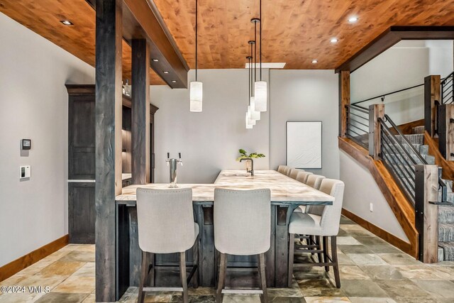 dining area with wooden ceiling