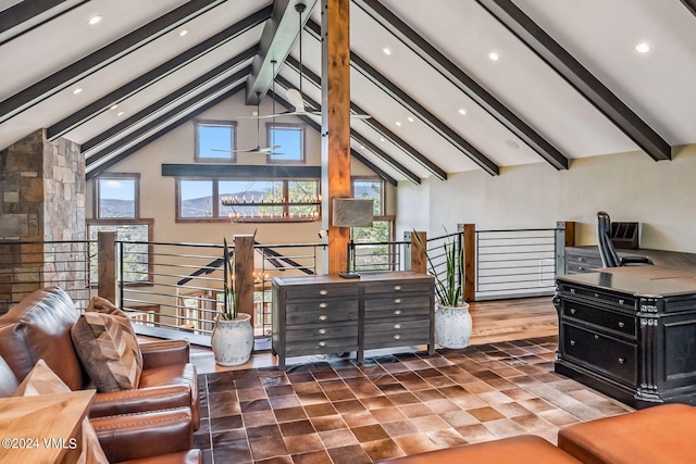 living room featuring high vaulted ceiling and beam ceiling