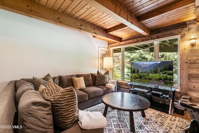 living room featuring wood ceiling and beamed ceiling