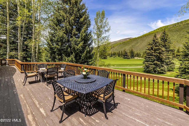 wooden terrace with a mountain view