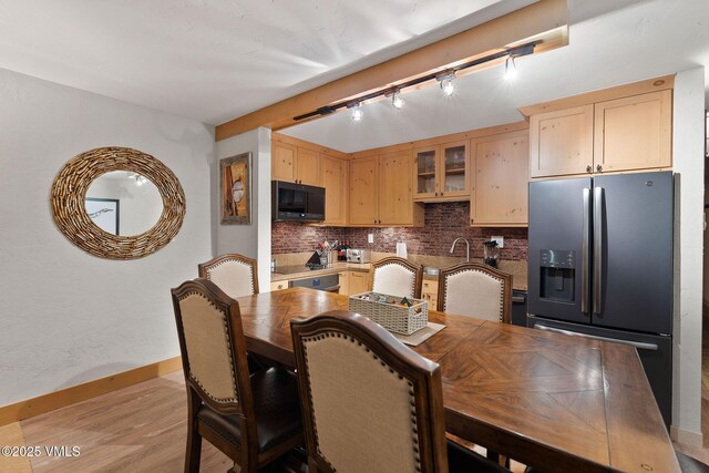 dining room with light hardwood / wood-style floors