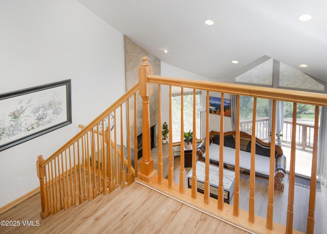 1082 W Wildwood Rd Unit C, Avon, CO 81620 - stairs with wood finished floors, recessed lighting, high vaulted ceiling, and a baseboard heating unit