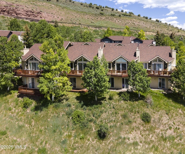 1082 W Wildwood Rd Unit C, Avon, CO 81620 - aerial view of residential area with a mountainous background