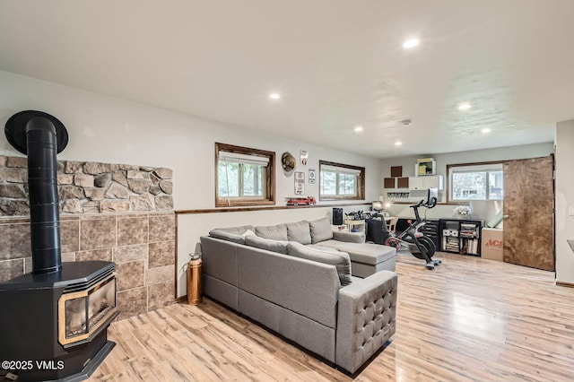 751 Bull Run, Eagle, CO 81631 - living area with light wood-style flooring, recessed lighting, and a wood stove