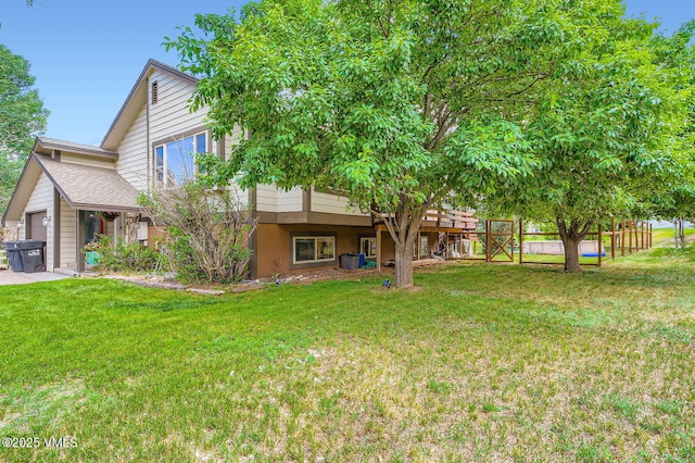 751 Bull Run, Eagle, CO 81631 - view of yard featuring an attached garage