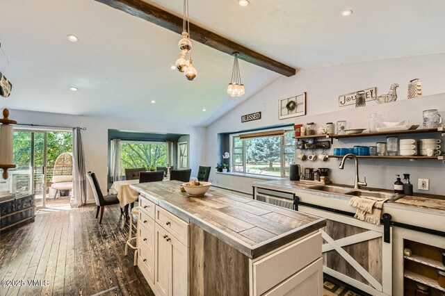751 Bull Run, Eagle, CO 81631 - kitchen featuring plenty of natural light, recessed lighting, dark wood-style floors, a center island, and white cabinets