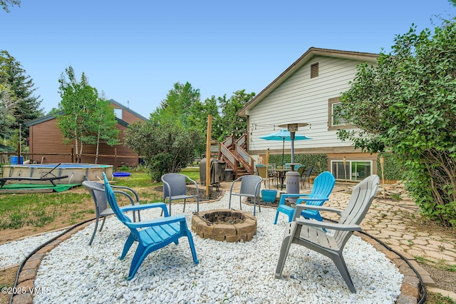 751 Bull Run, Eagle, CO 81631 - view of patio with an outdoor fire pit, stairway, and outdoor dining area