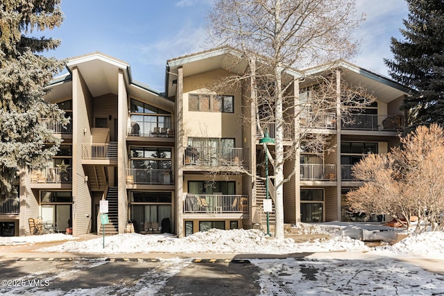 view of snow covered property