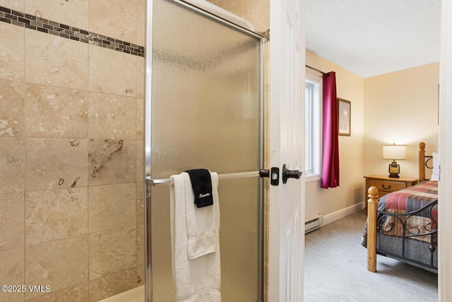 177 Lake St Unit 24, Avon, CO 81620 - bathroom featuring a baseboard heating unit, a stall shower, and baseboards