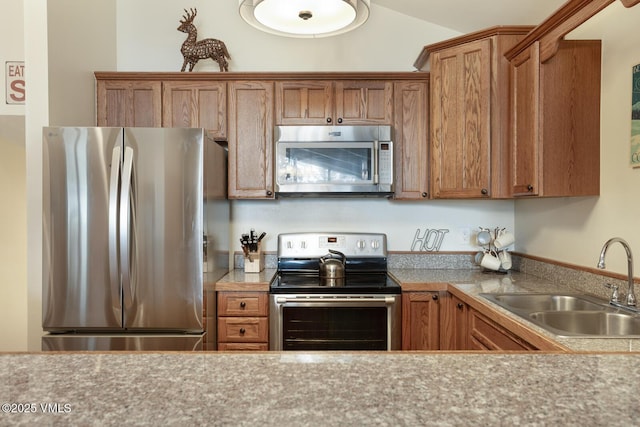 kitchen featuring appliances with stainless steel finishes and sink