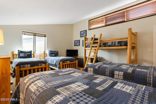 bedroom with vaulted ceiling