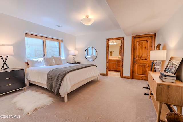57 Mccoy Creek Dr Unit A, Edwards, CO 81632 - bedroom with light colored carpet and ensuite bath
