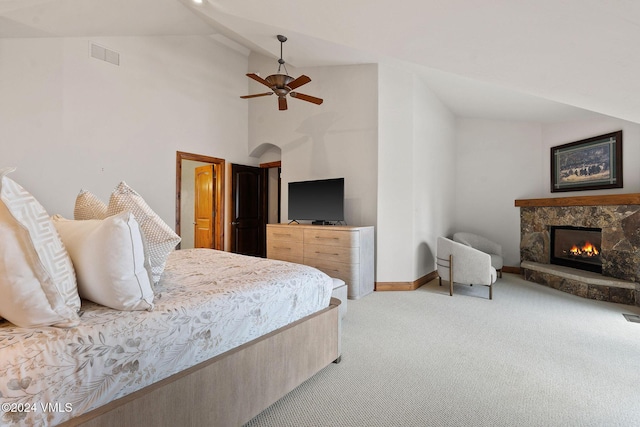 57 Mccoy Creek Dr Unit A, Edwards, CO 81632 - bedroom featuring carpet flooring, vaulted ceiling, a fireplace, and a ceiling fan