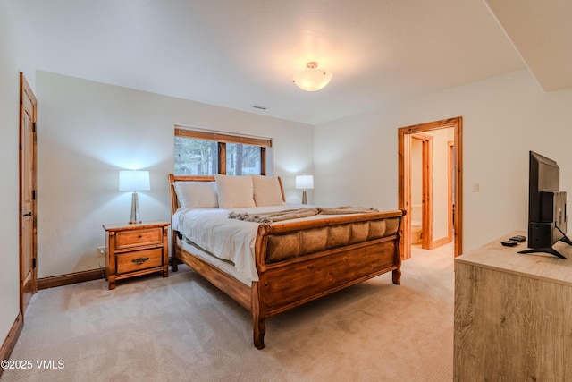 57 Mccoy Creek Dr Unit A, Edwards, CO 81632 - bedroom with light colored carpet and baseboards
